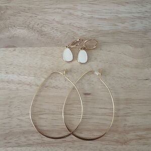 Two pairs earrings oval hoops and off-white dangle earrings